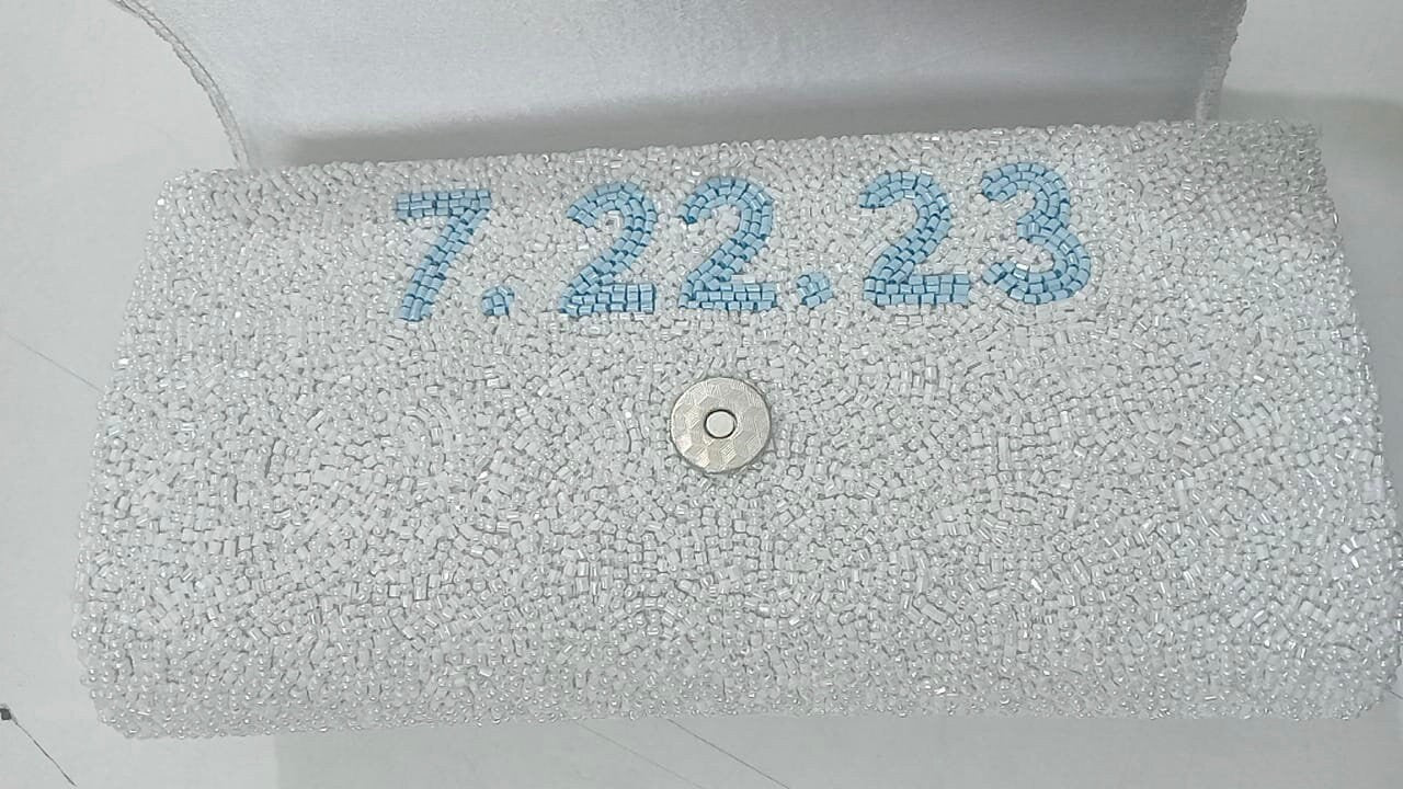 Custom beaded clutch with date under the flap